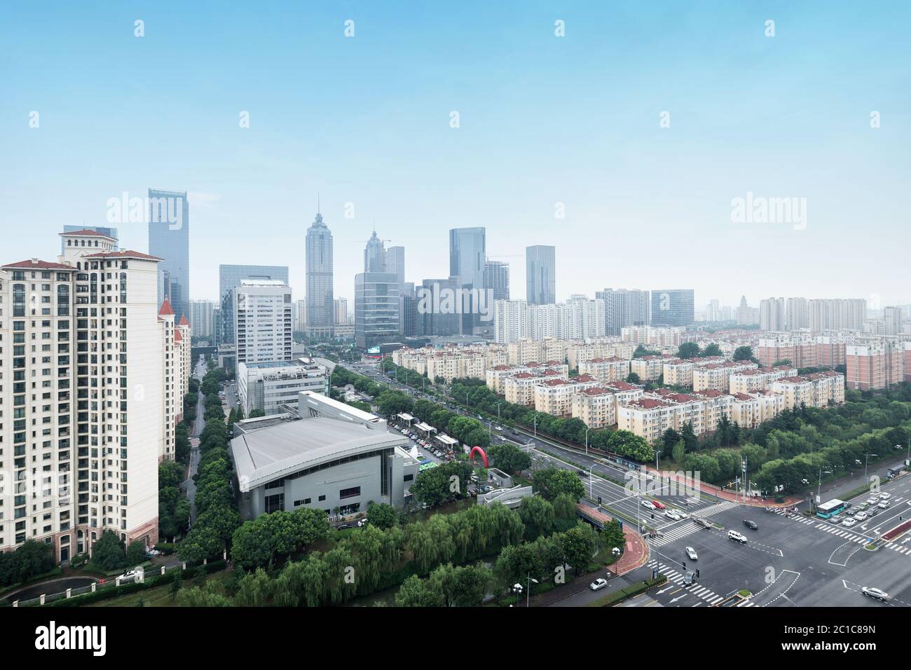 skyscrapers and mansions of a modern city Stock Photo - Alamy