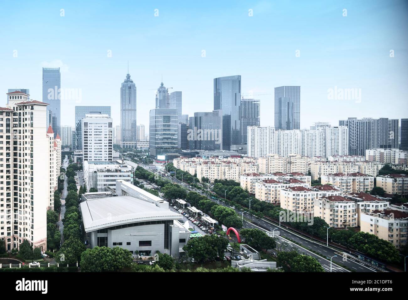 skyscrapers and mansions of a modern city Stock Photo - Alamy