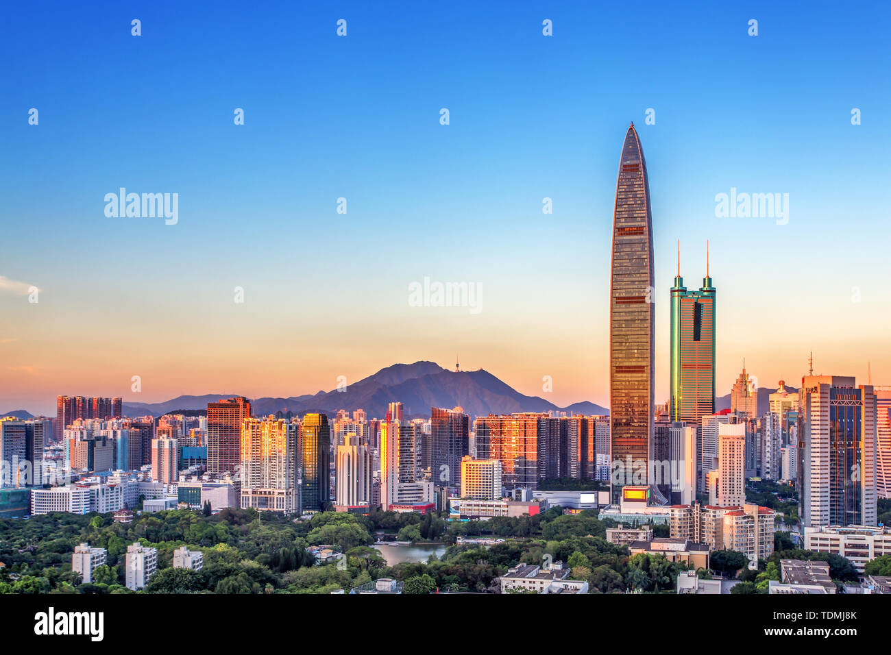 skyscrapers and mansions of a modern city Stock Photo - Alamy