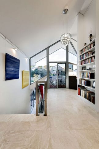 Chic Residence with Neutral Palette and Accents in a Vibrant Red