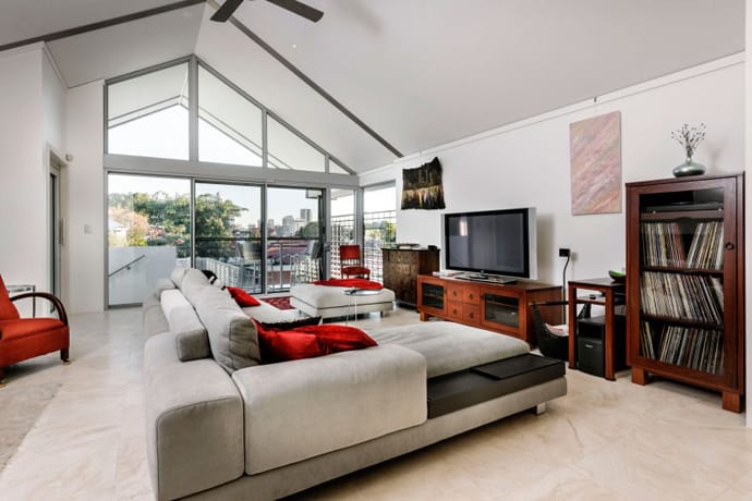 Chic Residence with Neutral Palette and Accents in a Vibrant Red