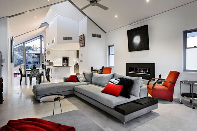Chic Residence with Neutral Palette and Accents in a Vibrant Red