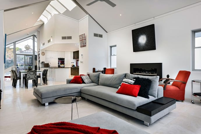 Chic Residence with Neutral Palette and Accents in a Vibrant Red