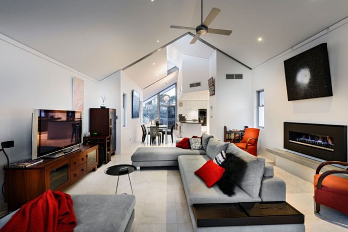 Chic Residence with Neutral Palette and Accents in a Vibrant Red
