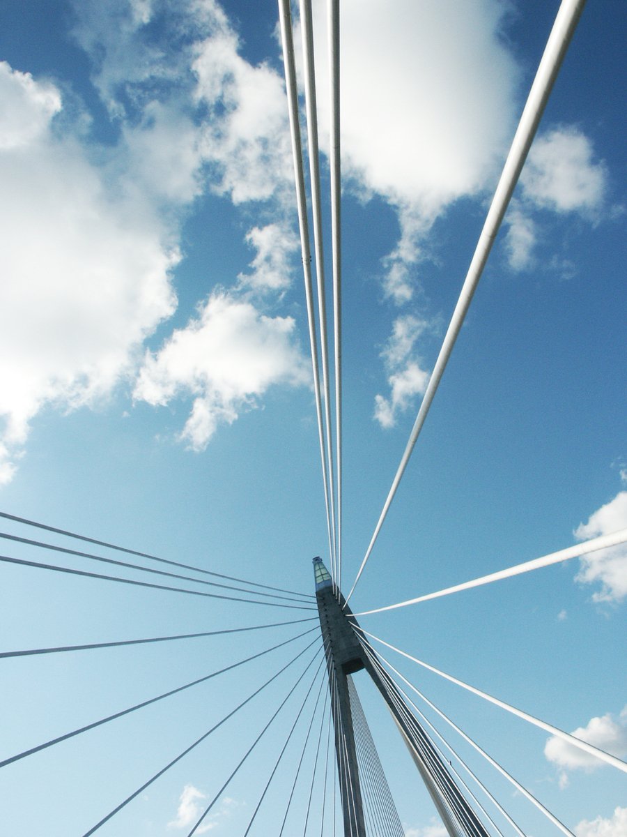 Modern cable-stayed bridge under clear blue sky Free Stock Photo ...