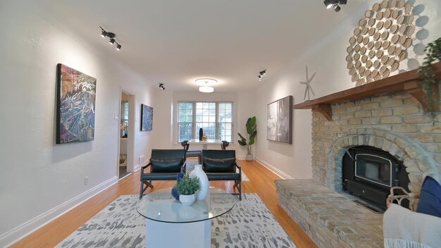Premium Photo | A living room with a fireplace and a fireplace with a ...