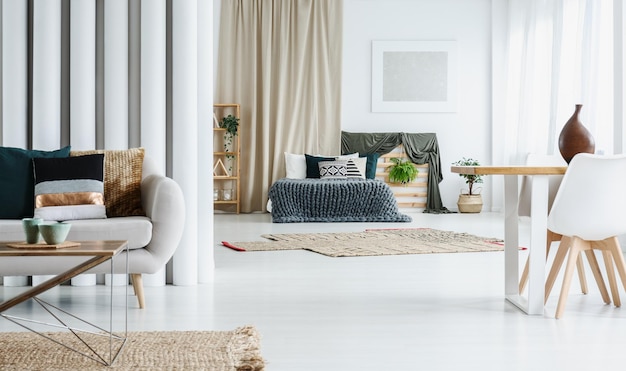 Premium Photo | Multifunctional living room with bed