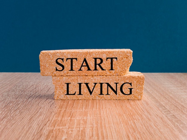 Premium Photo | Start living symbol concept words start living on ...