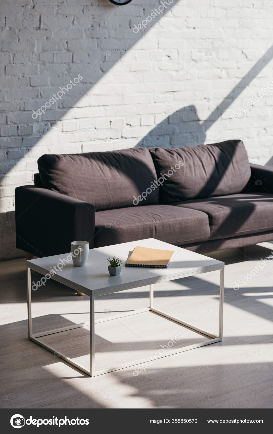 Living Room Grey Sofa Table Cup Notepad House Plant Sunlight ⬇ Stock ...