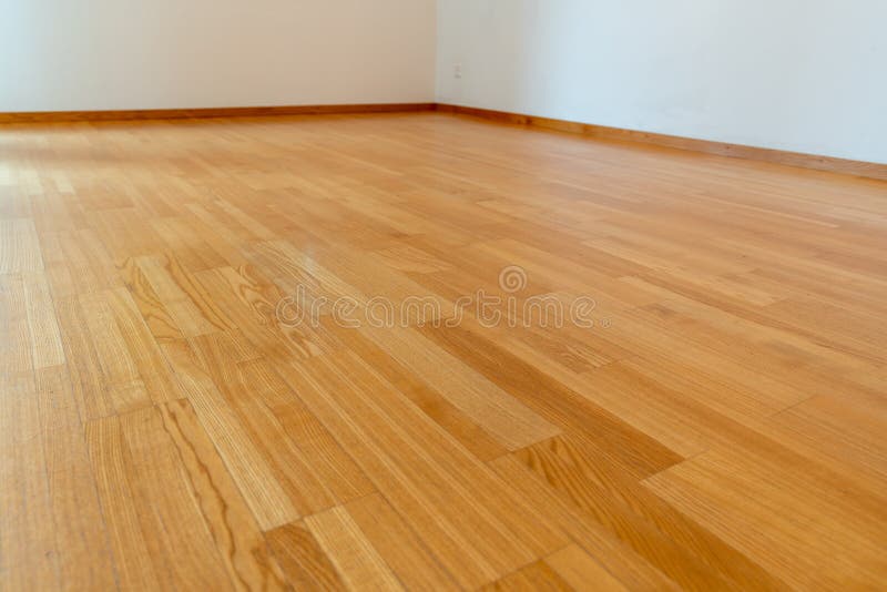Low Angle View of Wooden Parquet Floor in a Bright and Spacious Home ...