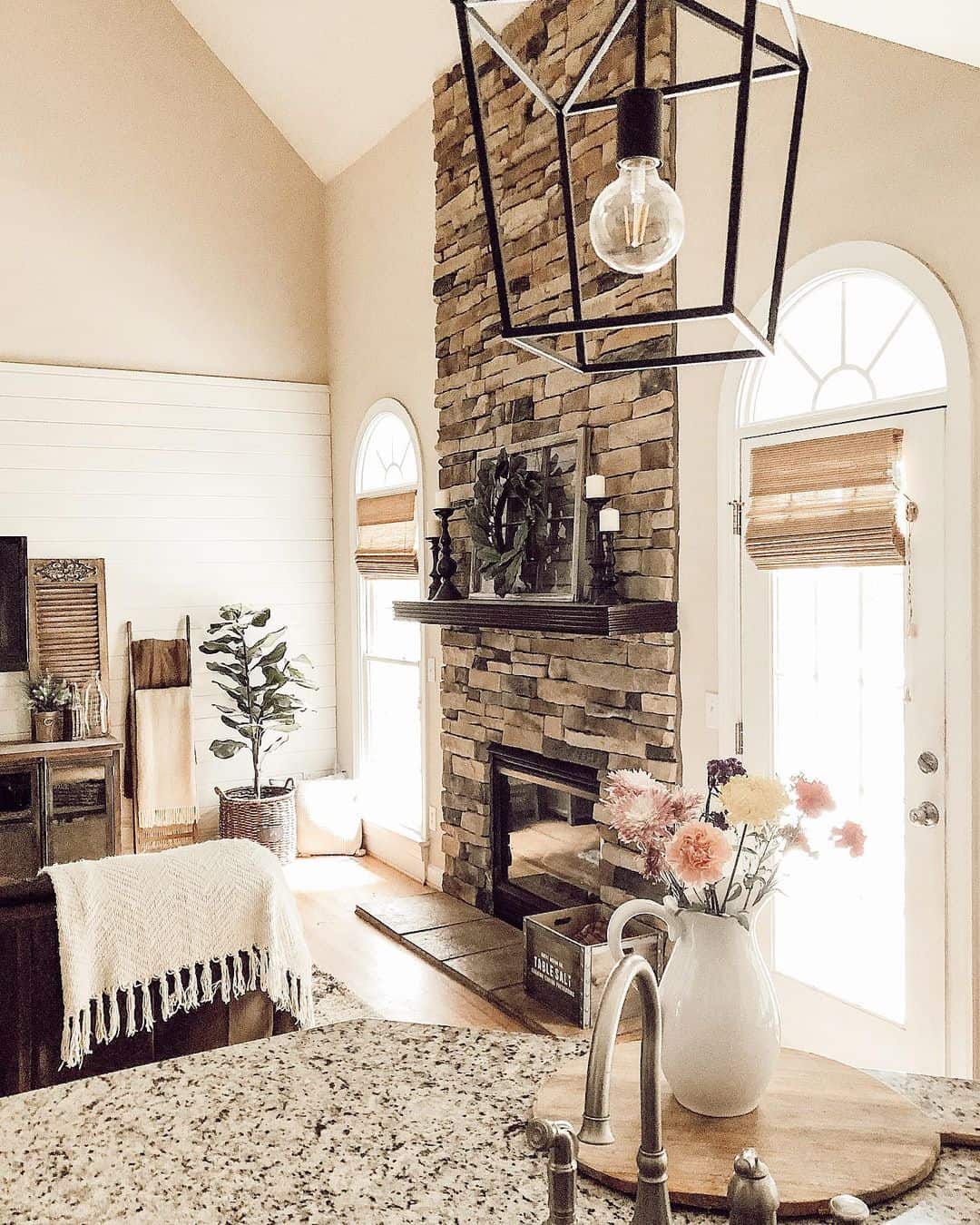 Living Room With Vaulted Ceiling and Fireplace - Soul & Lane